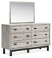 Vessalli Queen Panel Headboard with Mirrored Dresser and 2 Nightstands